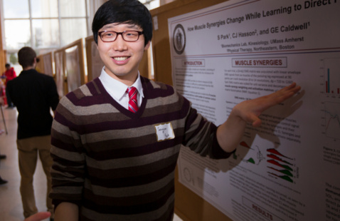 Student presenting a poster.