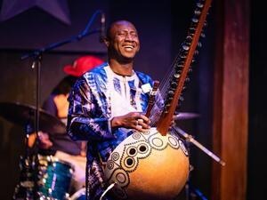 Photograph of Yacouba Sissoko during a live performance.