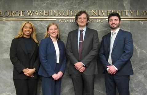 GW Law's Van Vleck Finalists pose for a photo in the Burns Moot Courtroom. 