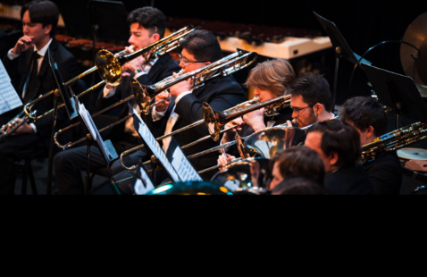 Students playing the trombone.