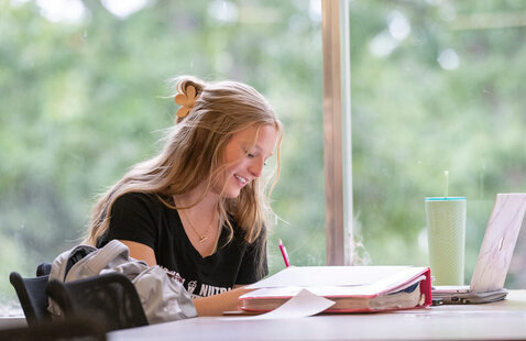 A student working on homework in Bear Central