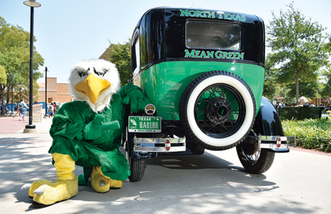 Scrappy next to the Mean Green mobile.