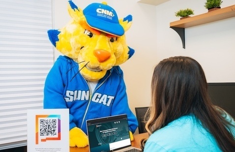 Sol speaks to a BeWell NM representative 