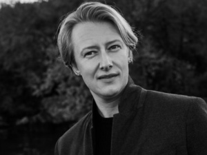 A black and white photograph of Lucas Bouk