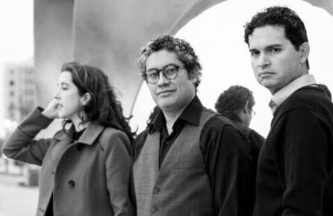 black and white photo of 3 musicians