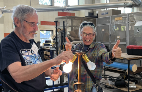 FUSE employees working on appliances