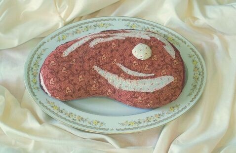 Electra Lowe, "Prime Cut," 2025, 11in x 7in., soft things from grandma's drawer (foam and found fabric).