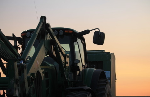 Tractor with sunset in background