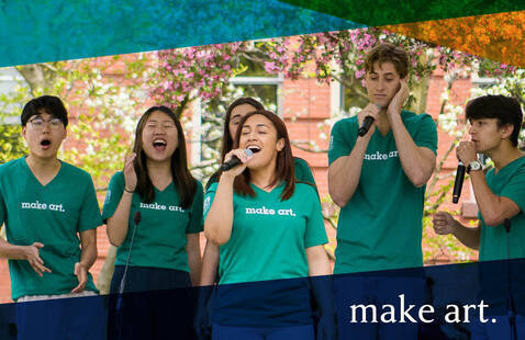 Student a cappella group singing outdoors. Each performer is wearing a green t-shirt that reads "make art" on the front.