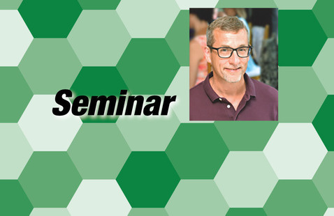 Dr. William Fahrenholtz's photo on green and white hexagon background