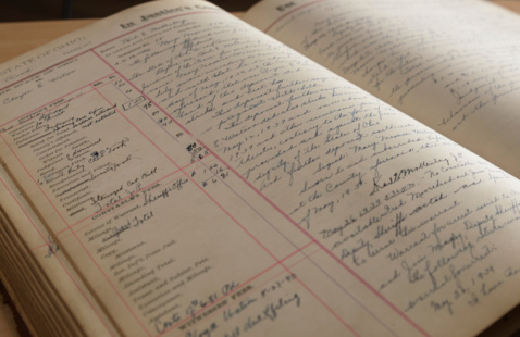 Historical log book written in handwritten cursive