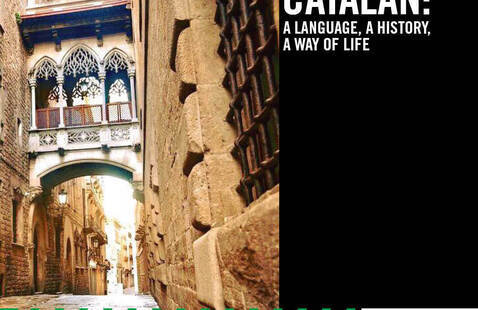 Alleyway in Catalan with text: come visit catalan, a language, a history, a way of life