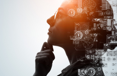 a women thinging with ai on her head