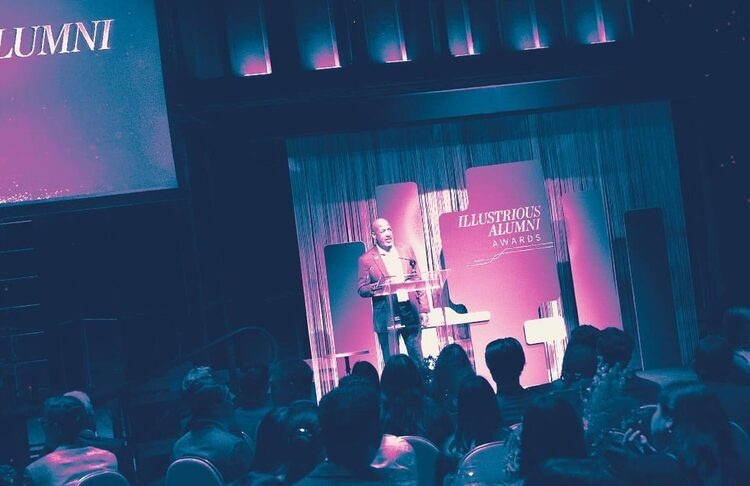 Alumni Awards audience and stage backdrop