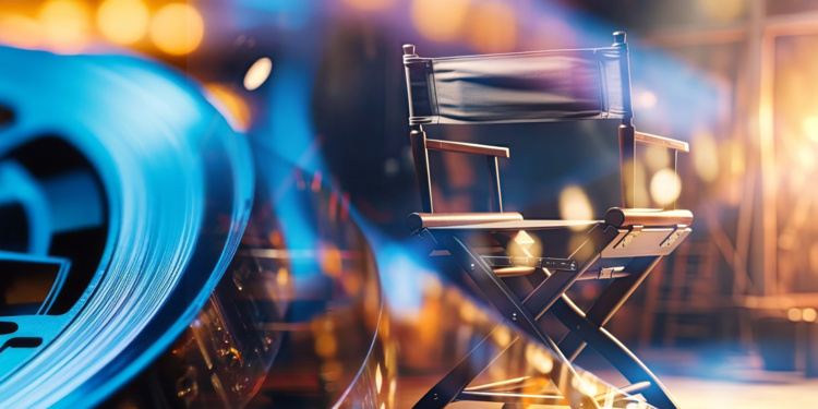 Director's chair with film reel and stage in back