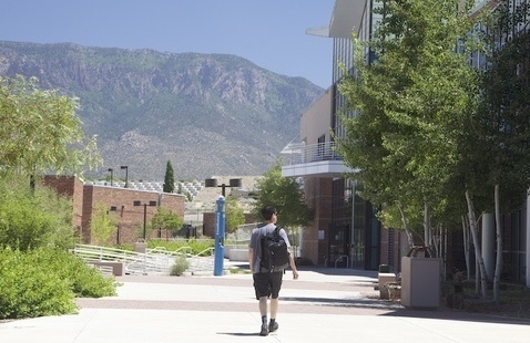 student walking through Montoya campus breezeway
