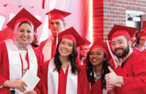 Miami graduates smiling