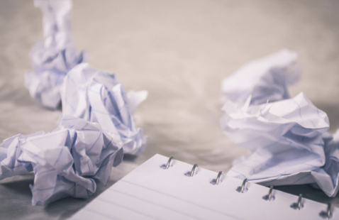 Crumbled up notebook paper