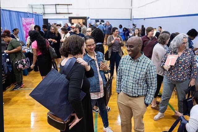 A group of U.N.C. staff gathering at the annual Wellness Expo.