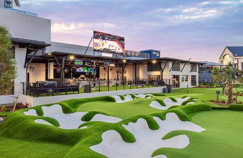 A picture of part of the PopStroke minigolf course and Biergarden