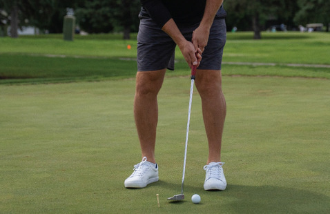Golfer putting