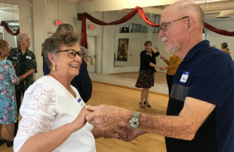 Two people dancing together at Dance With Me