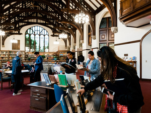 People look at books in the Reading Room.
