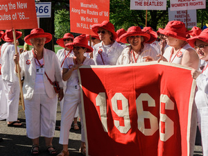 Class of 1966 holds up their class banner