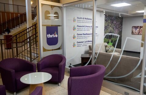 Thrive space in the Campus Center including comfortable chairs and workspaces.
