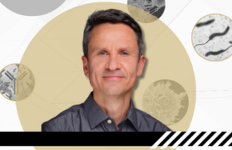 Banner with white background, black and white circular photos of immune and micro organisms, centered in front is a photo of Dr. Jörn Coers