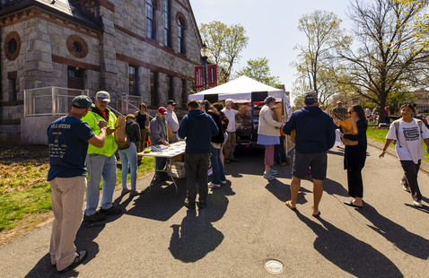 People tabling outside the Old Chapel at a prior Founders Day