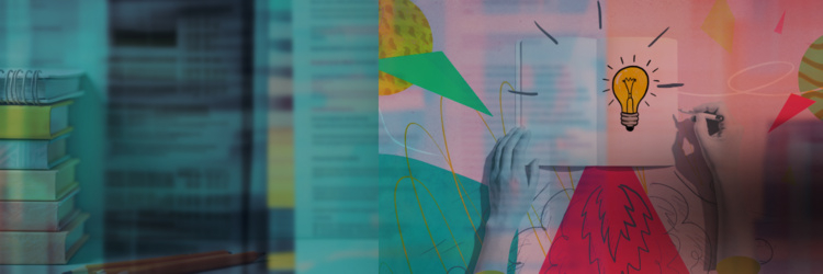 Hands writing in a journal with a lightbulb