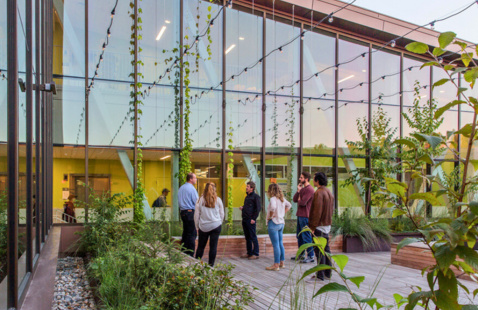 People in the Olver Design Building roof garden
