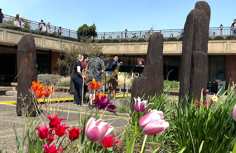 Du Bois Library Courtyard featuring stones and flowers