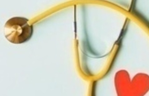 Yellow stethoscope and a valentine style heart