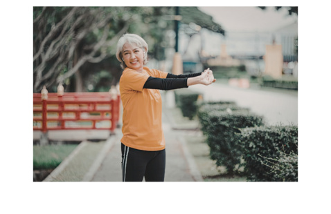 A person stretching their hands out