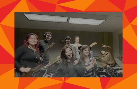 ArtsMembers of Admissions pose with their instruments in a practice room, in a red geometric frame