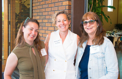 3 women smiling