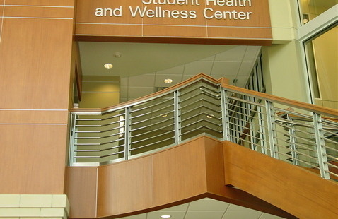 Staircase leading to the clinic with a sign that says, "Student Health and Wellness Center."