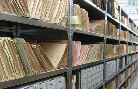 Shelves full of office files