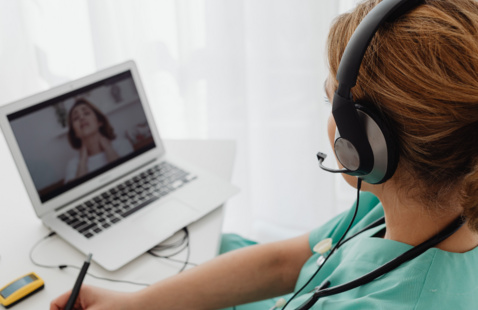 a faculty member on a zoom call 