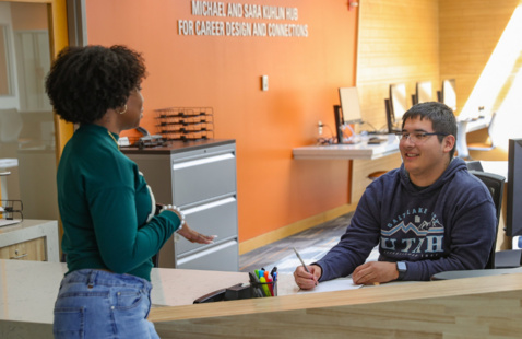 Two individuals engaged in career design services