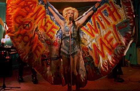 Still from Hedwig and the Angry Inch: John Cameron Mitchell's character Hedwig performs on a stage