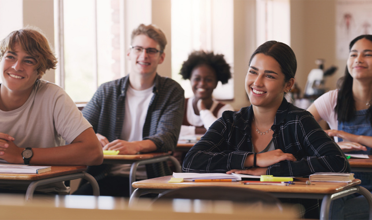 Students sit in a classroom.