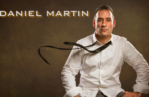 magician daniel martin performing in a show