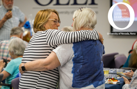 two women embracing at OLLI with the logo in the corner