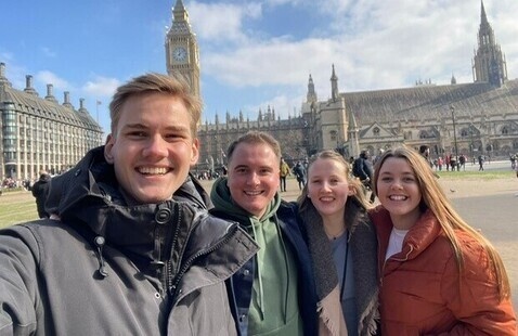 Group takes a selfie in historic location while studying abroad