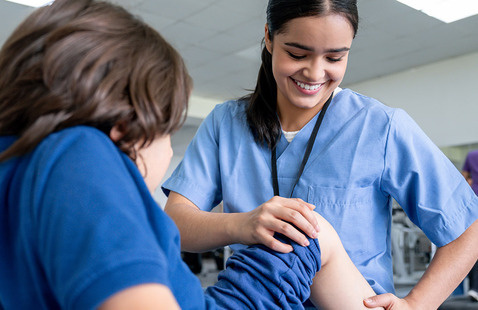 Photo of medical professional and a young patient
