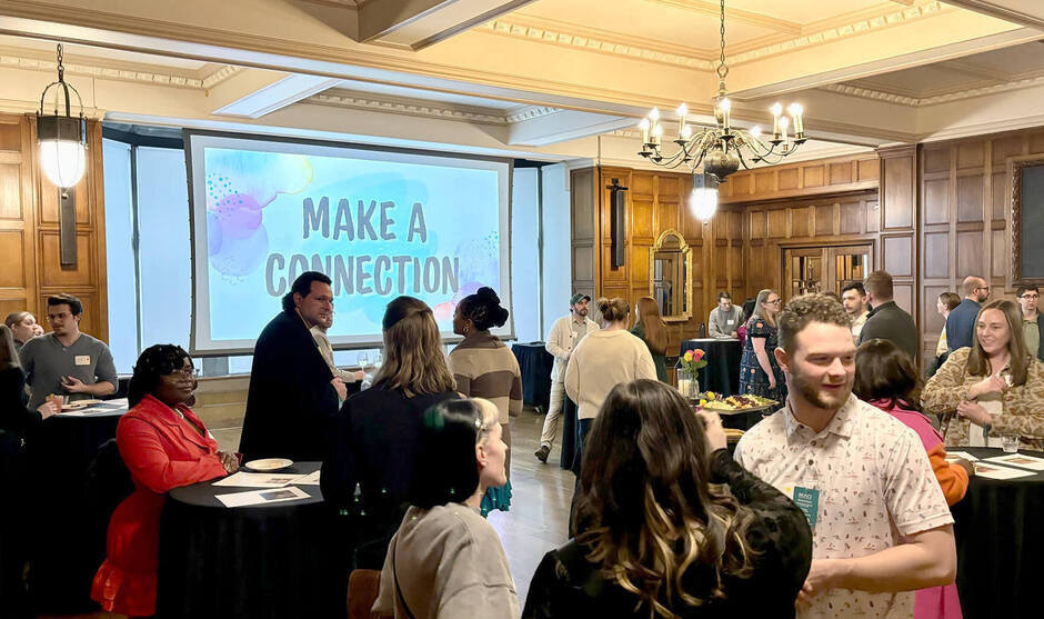 People mingling and having fun at a Make a Connection! event.
