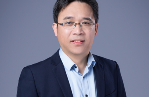Portrait photograph of Dr. Kun Zhang